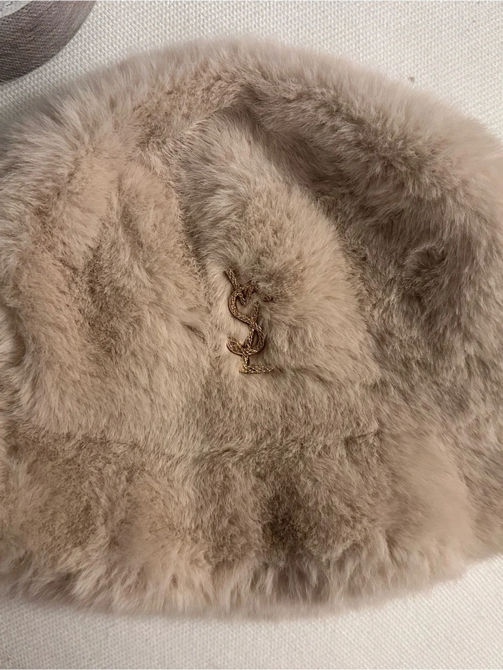 Source Unknown Beige Faux Fur Bucket Hat with Gold Logo Pin
